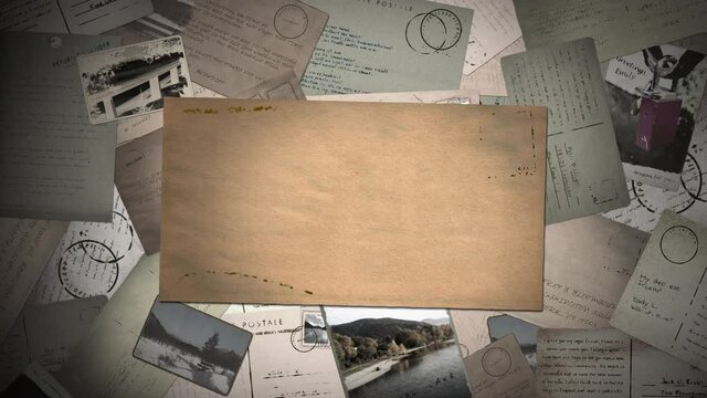 Stack of vintage postcards with empty placeholder card in the foreground