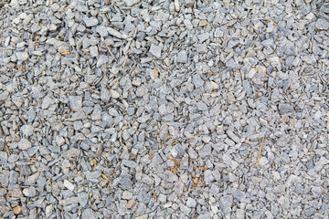 Crushed stone background, gray stone texture.