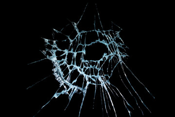 broken mirror glass on a colored and black background in cracks in the form of an isolated image abstraction