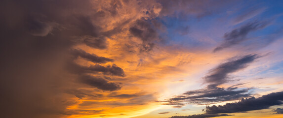 Naklejka na ściany i meble Panorama view of Beautiful nature sunset sky and clouds background