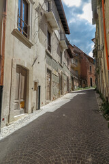 Small streets with houses in the city of Aquila, commune of L´aquila, Abruzzo region, Italy
