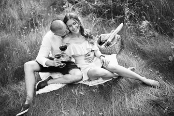 Tender couple having a picnic in park