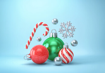 Christmas decor on blue background. Christmas balls, candy cane and silver snowflake