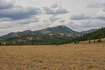 summer landscape with mountains and clouds