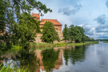 Fototapeta na wymiar Trakai Island Castle, Trakai, Lithuania, on an island in Lake Galve. Built in the 14th c. it was was one of the main centers of the Grand Duchy of Lithuania