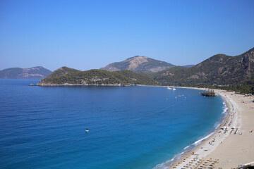 Wonderful view of the bay and mountains in the famous tourist town of Oludeniz in Turkey.