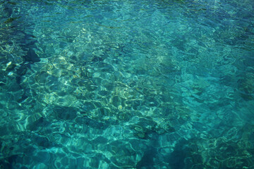 The surface of the clean and clear water of the Mediterranean.