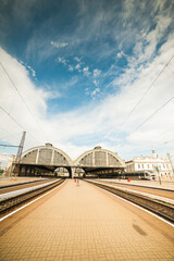 Old European train station with a platform. Arch metal train station.