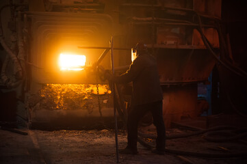 Metal structures and buildings of the old metallurgical plant inside and outside. The process of...