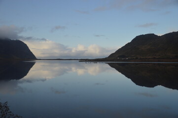 Autumn colors and reflections in the Norwegian mountains of the Lofoten Fjords in Norway