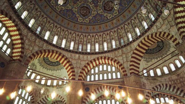 interior of Suleymaniye Mosque, hand-painted walls, ceiling, oriental pattern.