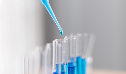 Doctor is testing a vaccine against the virus in the lab.