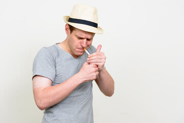 Portrait of young handsome tourist man ready for vacation