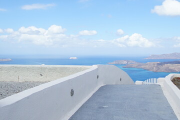 Fototapeta na wymiar Beautiful landscape of Santorini island from the restaurant
