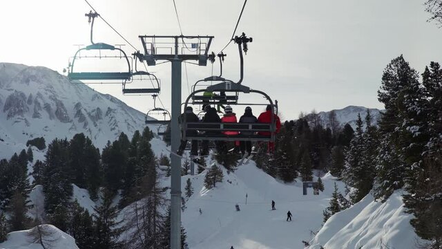 Going up the ski lift at La Plagne ski resort, Tarentaise, Savoy, French Alps