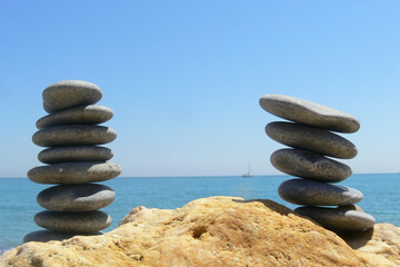 Pebbles on each other on a rock - meditation in the French Riviera