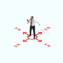 Studio shot of people demonstrating social distancing with arrows indicating the separation. Office worker during coronavirus outbreak with new rules for safety and healthcare. High angle view