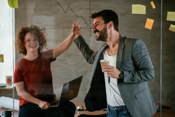 Businessman working on project. Young businessman working in the office.
