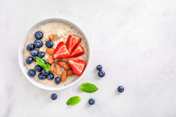 Healthy homemade oatmeal with berries for breakfast