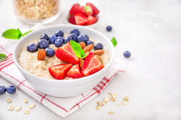 Healthy homemade oatmeal with berries for breakfast