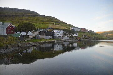 Fototapeta na wymiar The dramatic and charming nature and mountains on the Faroe Islands