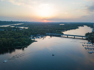 Sunset over the Dnieper River in Kiev. Aerial drone view.