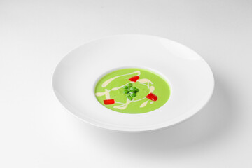 green soup on a plate