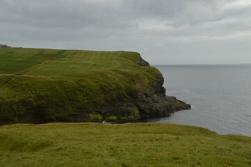 The dramatic and charming nature and mountains on the Faroe Islands
