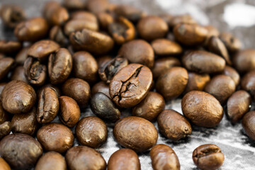 Roasted coffee beans close up. Coffee concept