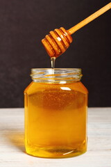 Jar of Honey with Honey Dipper