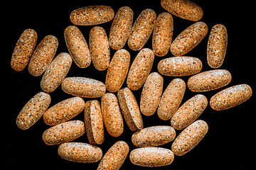 close-up of multivitamin pills. dietary concept. dietary supplement topview.
