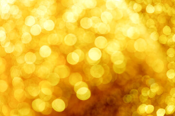 Obraz premium Golden bokeh background, Abstract background bokeh blurred, Shiny bokeh light effect.