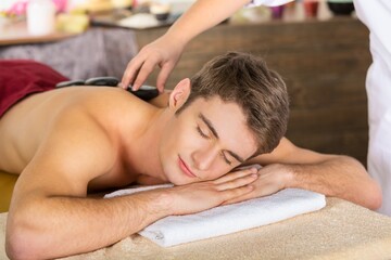 Obraz na płótnie Canvas Man in Spa Receiving Massage