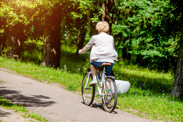 Cyclist ride on the bike path in the city Park
