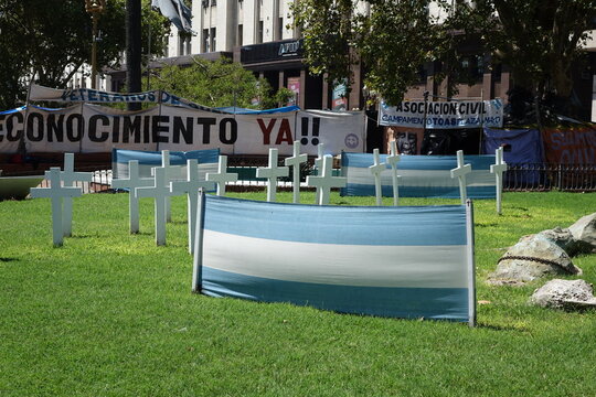 ARGENTINA - BUENOS AIRES - CROSSES DESAPARECIDOS AND FLAG PLAZA DE MAYO.
