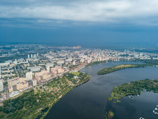 Aerial view of the Dnieper River and the city of Kiev from above. Summer sunny day.