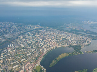 Fototapeta premium Aerial view of the Dnieper River and the city of Kiev from above. Summer sunny day.