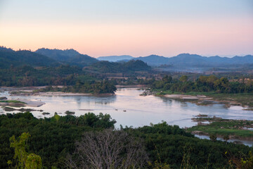 Fototapeta na wymiar View of the Mekong River with mountain and forest border of Thailand and Laos, NongKhai province,Thailand.