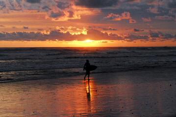 Costa Rica- Surfer in Sunrise Silhouette
