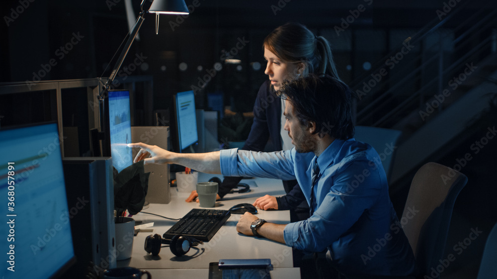 Poster ambitious businessman uses desktop computer, his female project manager explains specific tasks, acc