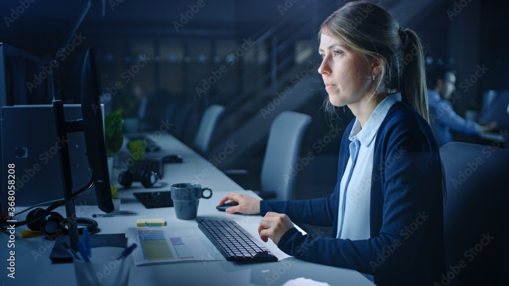 Aufkleber Working Late at Night in the Office: Businesswoman Using Desktop Computer, Analyzing, Using Documents, Solving Problems, Finishing Project. 