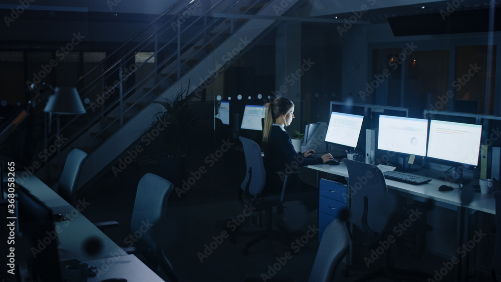 Poster Working Late at Night in the Office: Businesswoman Using Desktop Computer, Analyzing, Using Documents, Solving Problems, Finishing Project. 