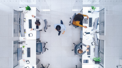 Top Down Shot of Big Busy Corporate Office with Two Rows off Businessmen and Businesswomen Working...