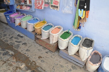 Bags with powder for leather paint and dying at the street of fes, Morocco.