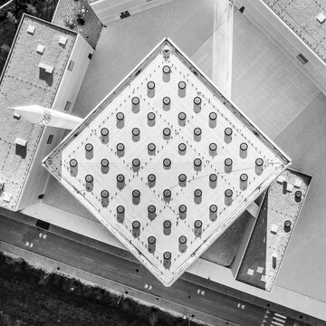 Top aerial view of modern archiecture of islamic religious cultural centre in Ljubljana, Slovenia, Europe. Black and white image.