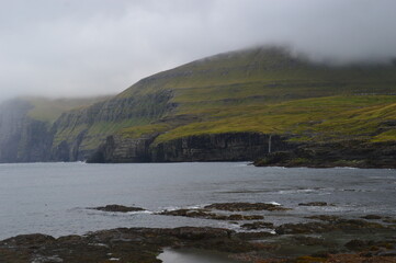 The dramatic coast and mountain landscapes of the Faroe Islands