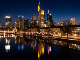 Fototapeta na wymiar Frankfurt-am-Main, GERMANY- April 11, 2020: Skyline of Frankfurt, Germany at night.