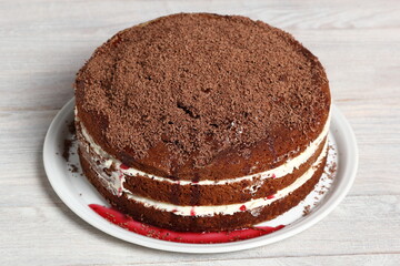 Layer Cake with cream with grated chocolate topping