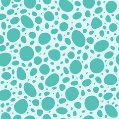 Seamless light blue pattern with blue shapeless spots, like water drops on glass.