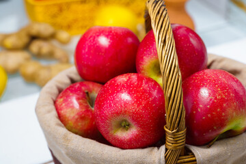 beautiful red apples in a basket close up